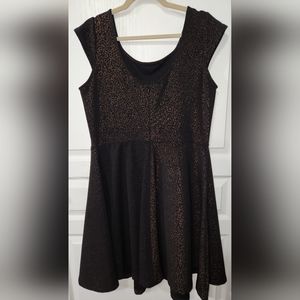 Retro style dress. Dark charcoal black either gold design.